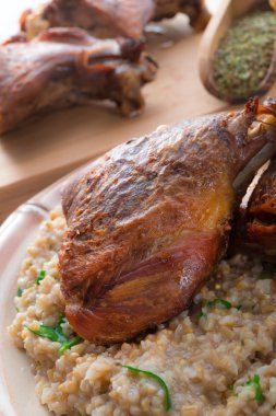 roasted goose thighs with grits