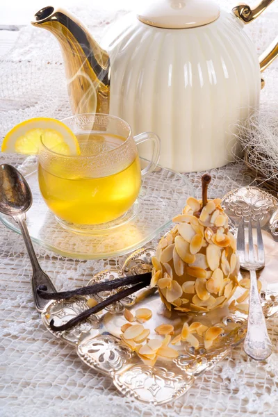 Almonds pear and tea — Stock Photo, Image