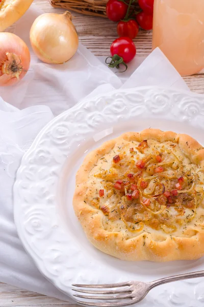 Onion tart and young wine — Stock Photo, Image