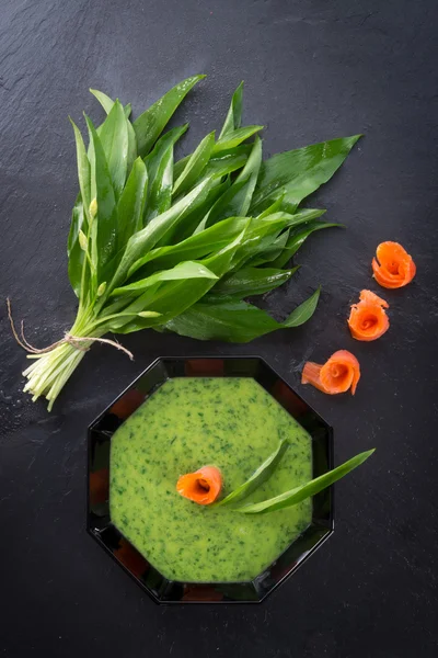 Garlic soup with smoked salmon — Stock Photo, Image