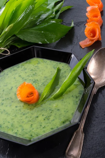 Garlic soup with smoked salmon — Stock Photo, Image