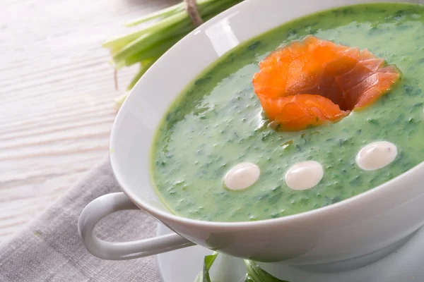 Garlic soup with smoked salmon — Stock Photo, Image