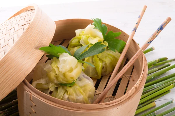 Cabbage with rice bags — Stock Photo, Image