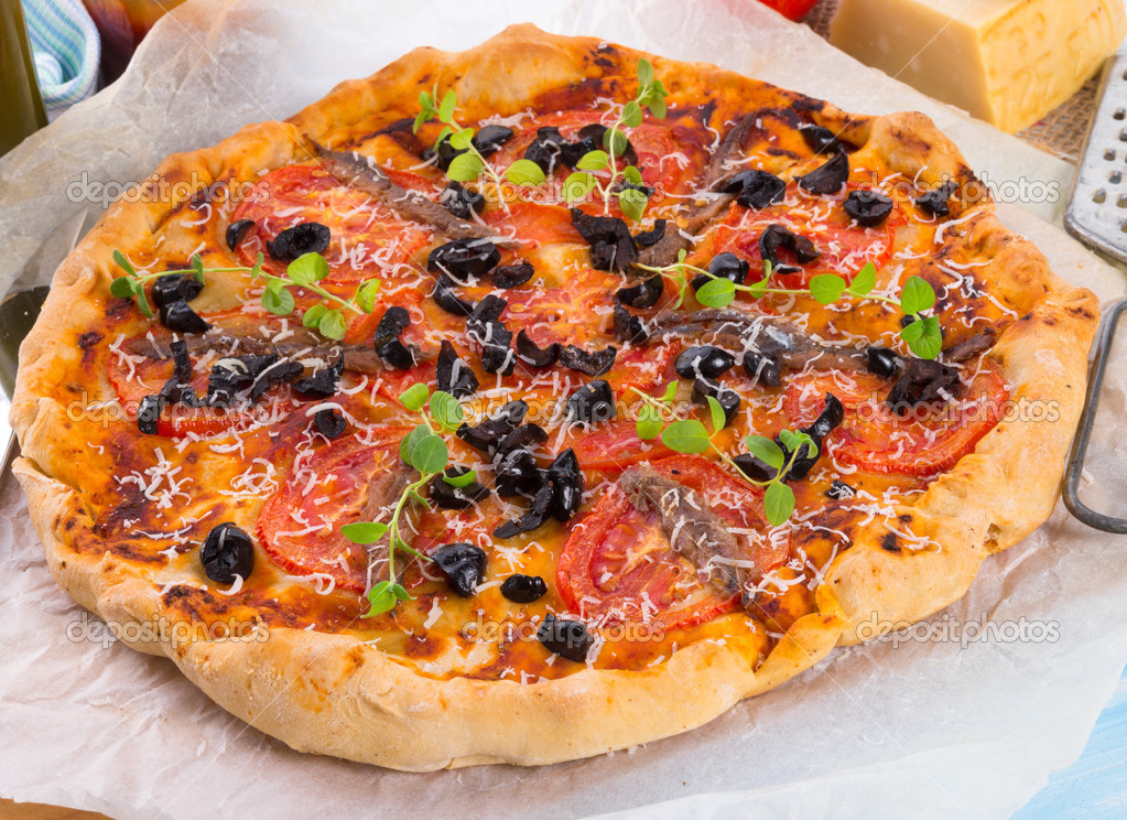 Olive anchovy pizza Stock Photo by ©dar19.30 48694597