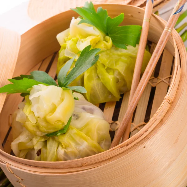 Cabbage with rice bags — Stock Photo, Image