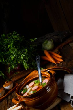Potato kohlrabi soup with bockwurst