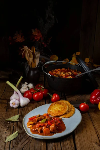 Hungarian goulash with potato pancakes