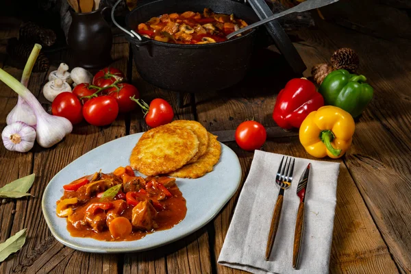 Hungarian goulash with potato pancakes