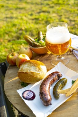 grilled sausage with pickles