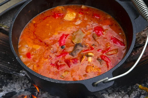 stock image Kettle goulash is prepared over an open fire!