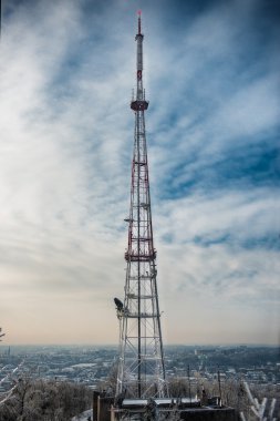 Radio tower near the big city clipart
