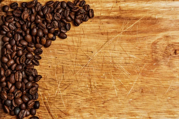 Coffee beans on wooden background — Stock Photo, Image