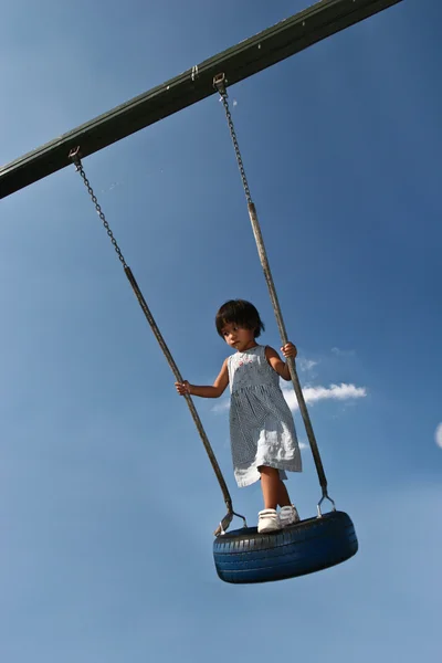 Girl on a swing — Stock Photo, Image