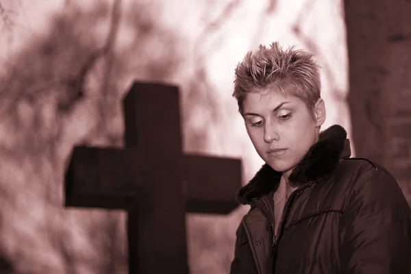 Woman and cross — Stock Photo, Image