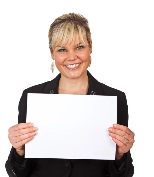 Studio portrait of a cute blond girl holding a piece of paper Stock Picture