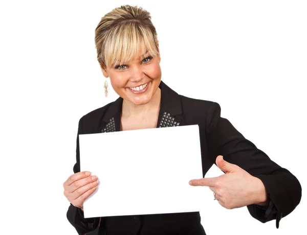 Studio portrait of a cute blond girl holding a piece of paper Royalty Free Stock Images