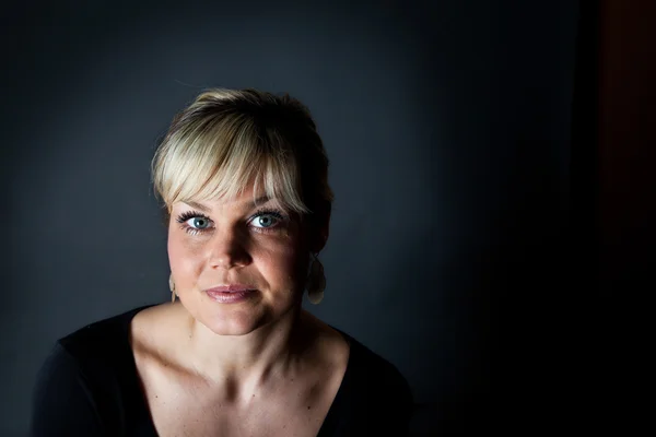 Studio portrait of a cute blond girl — Stock Photo, Image