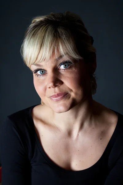 Studio portrait of a cute blond girl — Stock Photo, Image