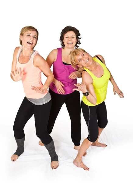 Три танцующие женщины — стоковое фото