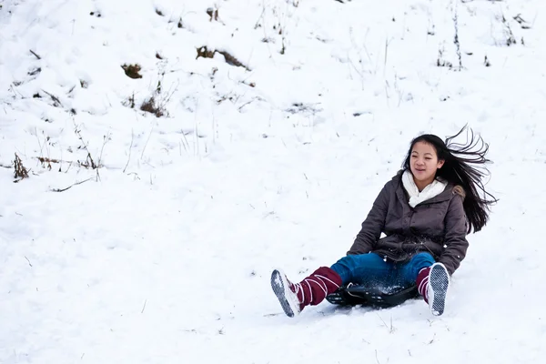 Girl sledging — Stock Photo, Image