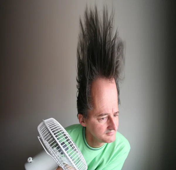 Man with hair dryer — Stock Photo, Image