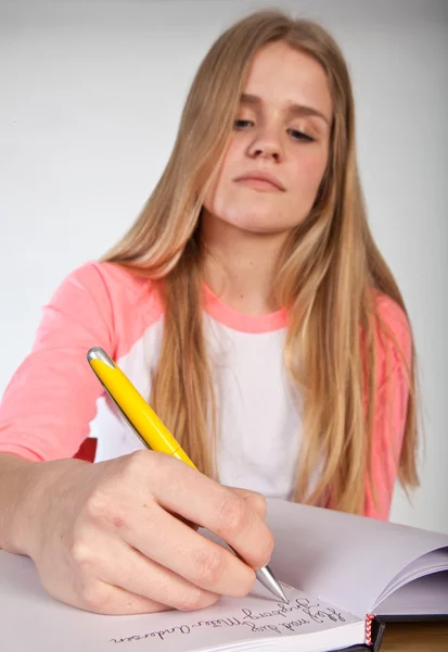 Scandinavian cute young girl writting — Stock Photo, Image