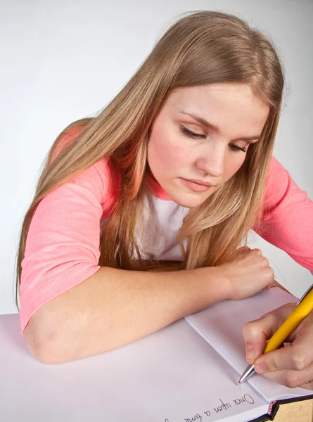 Scandinavian cute young girl writting — Stock Photo, Image