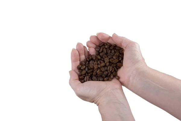 Kaffeehände mit Bohnen — Stockfoto