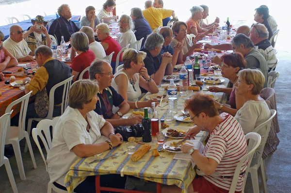 Banquet of tourists on holiday — Stock Photo, Image