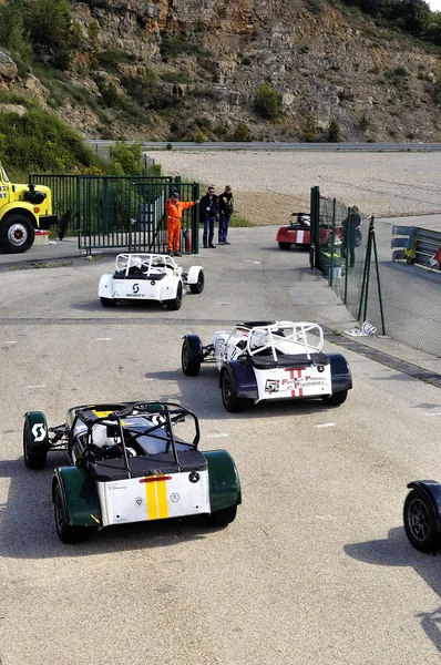 การไล่ล่าของ Caterham — ภาพถ่ายสต็อก