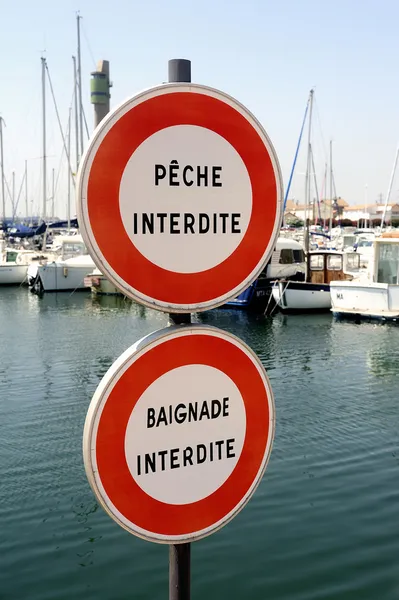 Panneaux poissons et bains interdits — Photo