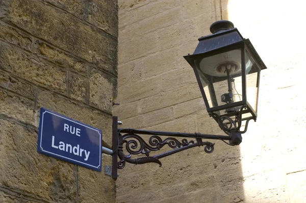 Plate Landry Street and public lighting lantern — Stock Photo, Image