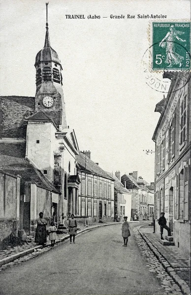 Old postcard of Trainel, high rue Saint Antoine — Stock Photo, Image