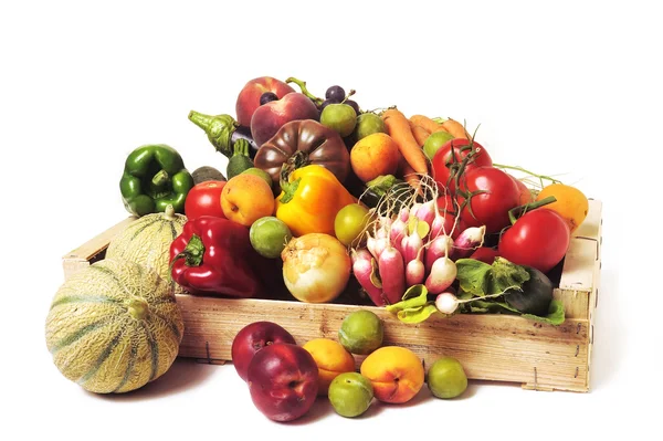 Crates of fruit and vegetables on white background in studio. — Stock Photo, Image