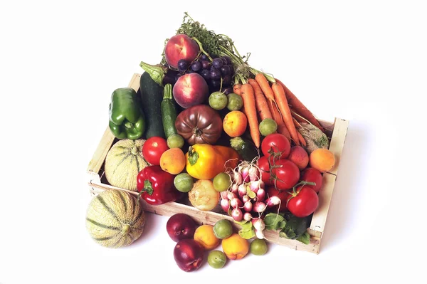 Crates of fruit and vegetables on white background in studio. — Stock Photo, Image