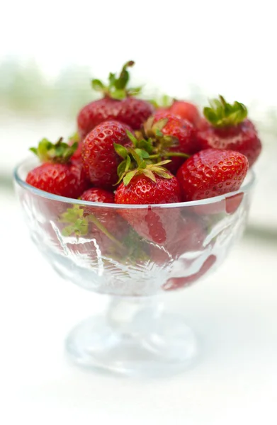 Ripe strawberry in glass bowl — Stock Photo, Image
