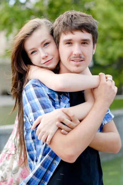 Young happy smiling couple embracing — Stock Photo, Image