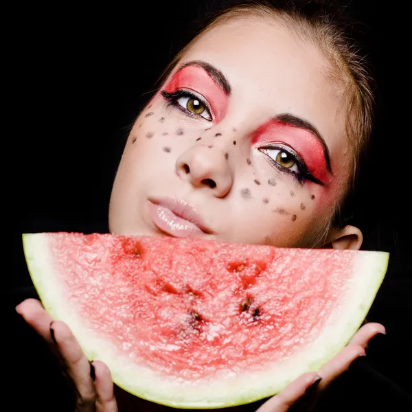 Mladá krásná žena a meloun portrét — Stock fotografie