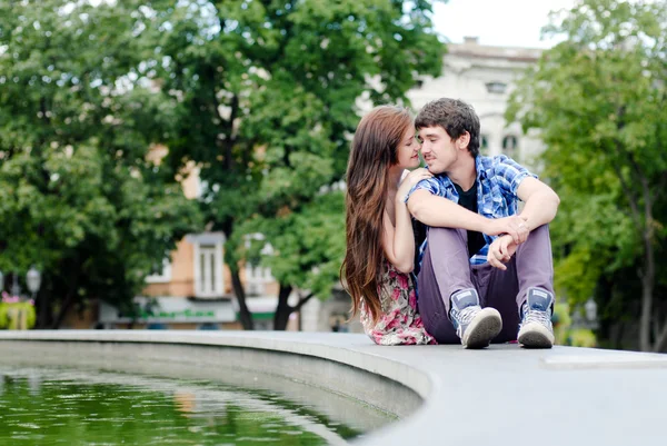 Young happy smiling couple embracing — Stock Photo, Image