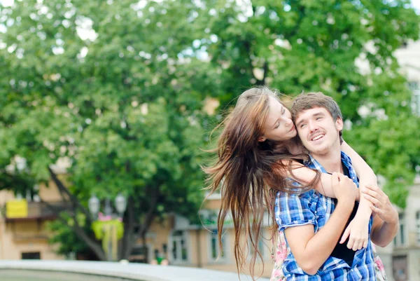 Young happy smiling couple embracing — Stock Photo, Image