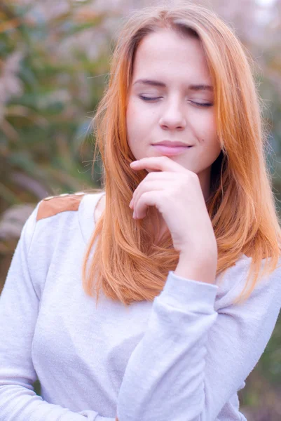 Young happy woman closing eyes dreamy — Stock Photo, Image