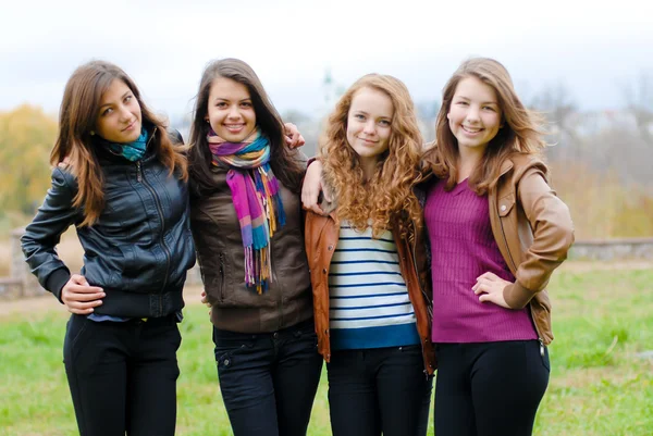 Four happy teenage friends — Stock Photo, Image