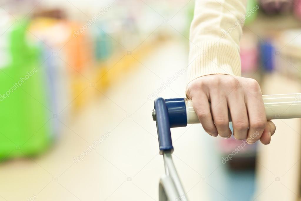 Woman and push cart