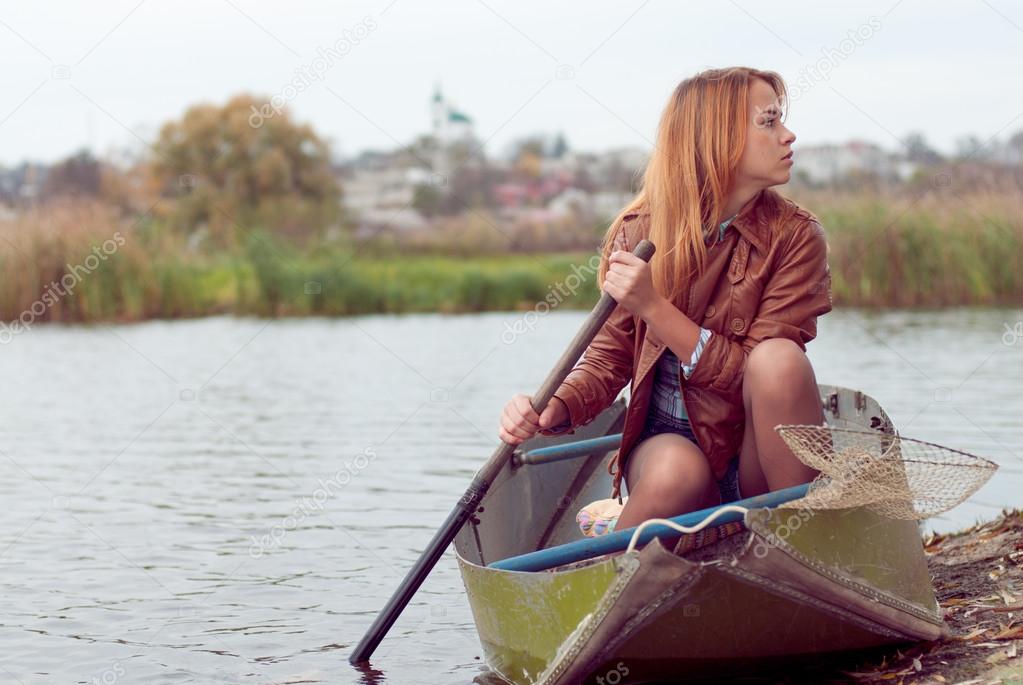 Young woman on a boat