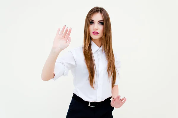 Joven mujer de negocios tocando la pantalla virtual en blanco —  Fotos de Stock