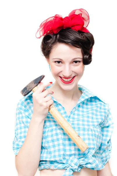 Funny pinup woman holding hammer — Stock Photo, Image