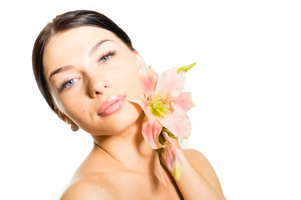 Closeup on beautiful girl face and lilly — Stock Photo, Image