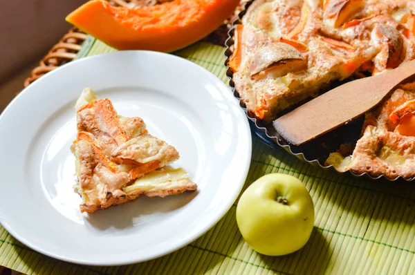 Piece of homemade apple and pumpkin pie — Stock Photo, Image