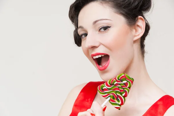 Funny pin up girl and lollipop — Stock Photo, Image