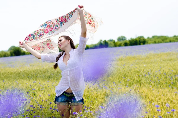 Woman in  wheat  field holding  shawl — Stock Photo, Image